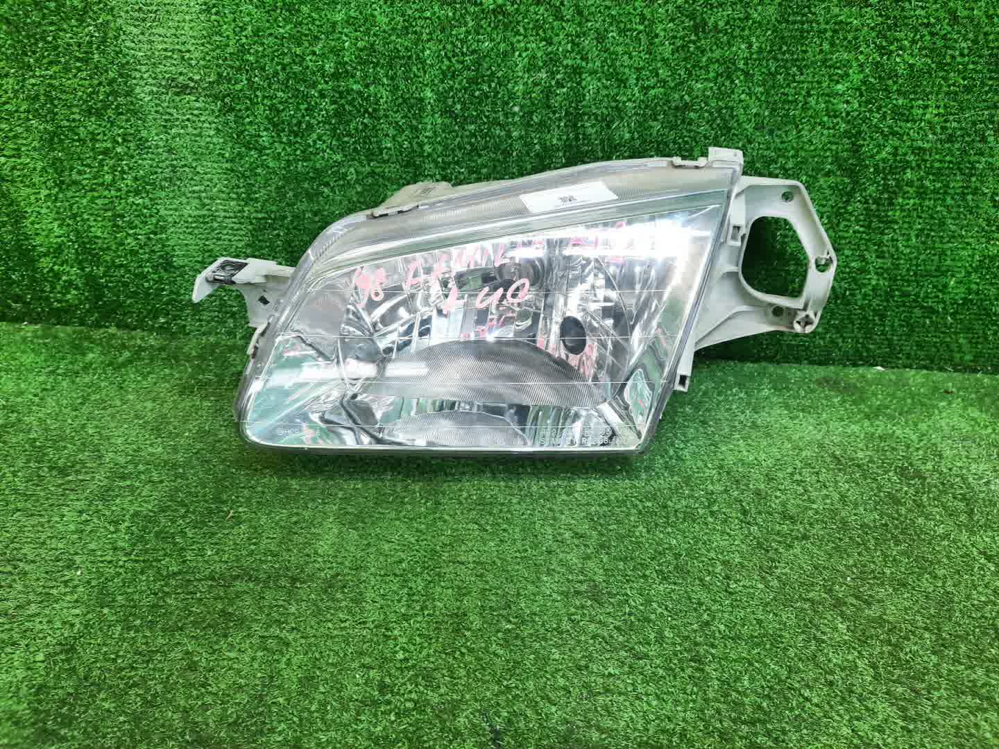 Фара левая передняя MAZDA FAMILIA, 323 BJ5W, BJ5P, BJEP, BJFW, BJ8W, BJ3P, BJFP, BJ 1 ракурс