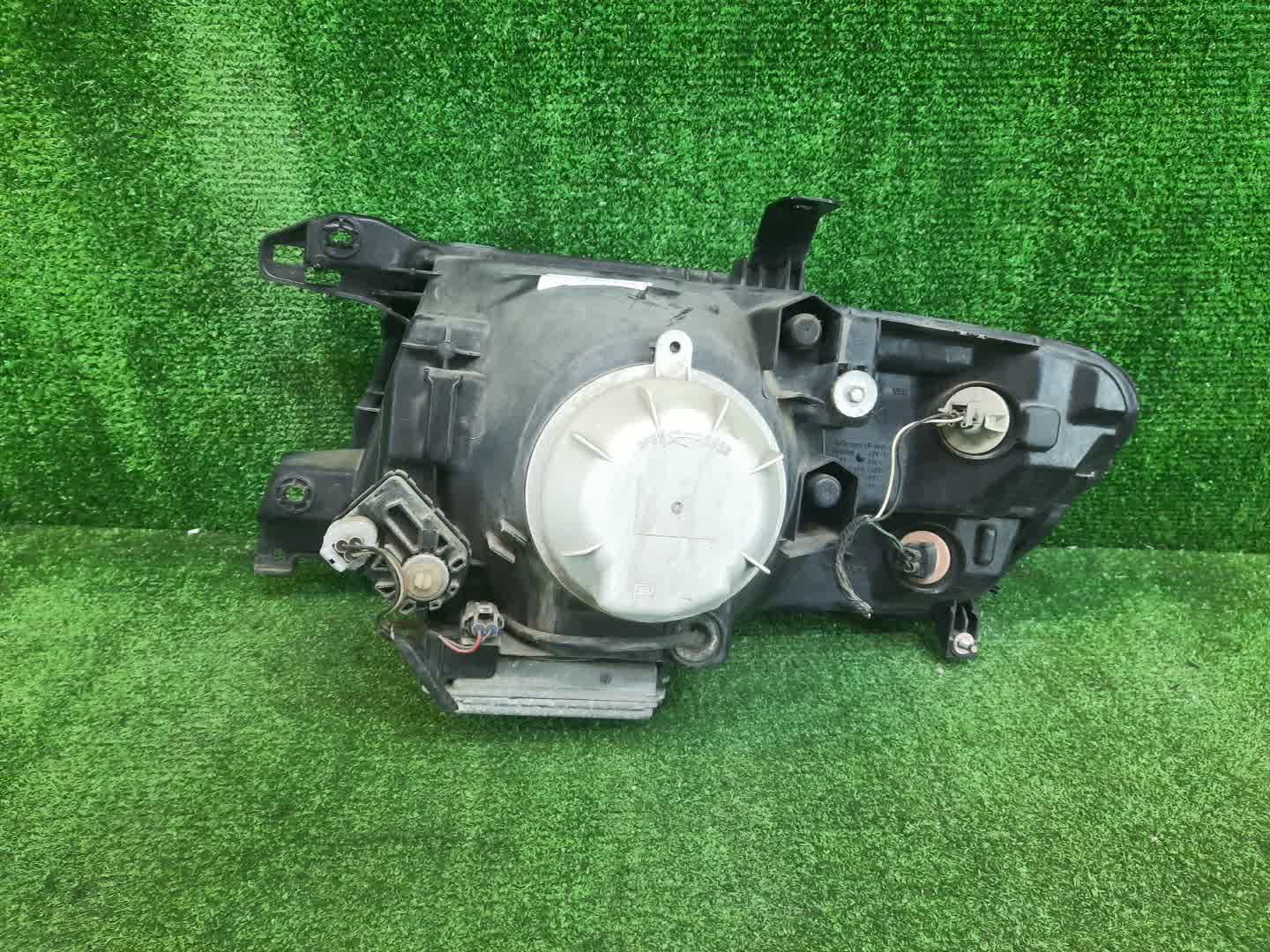Фара правая передняя MITSUBISHI PAJERO V75W, V65W, V78W, V73W, V77W, V63W, V68W 2 ракурс