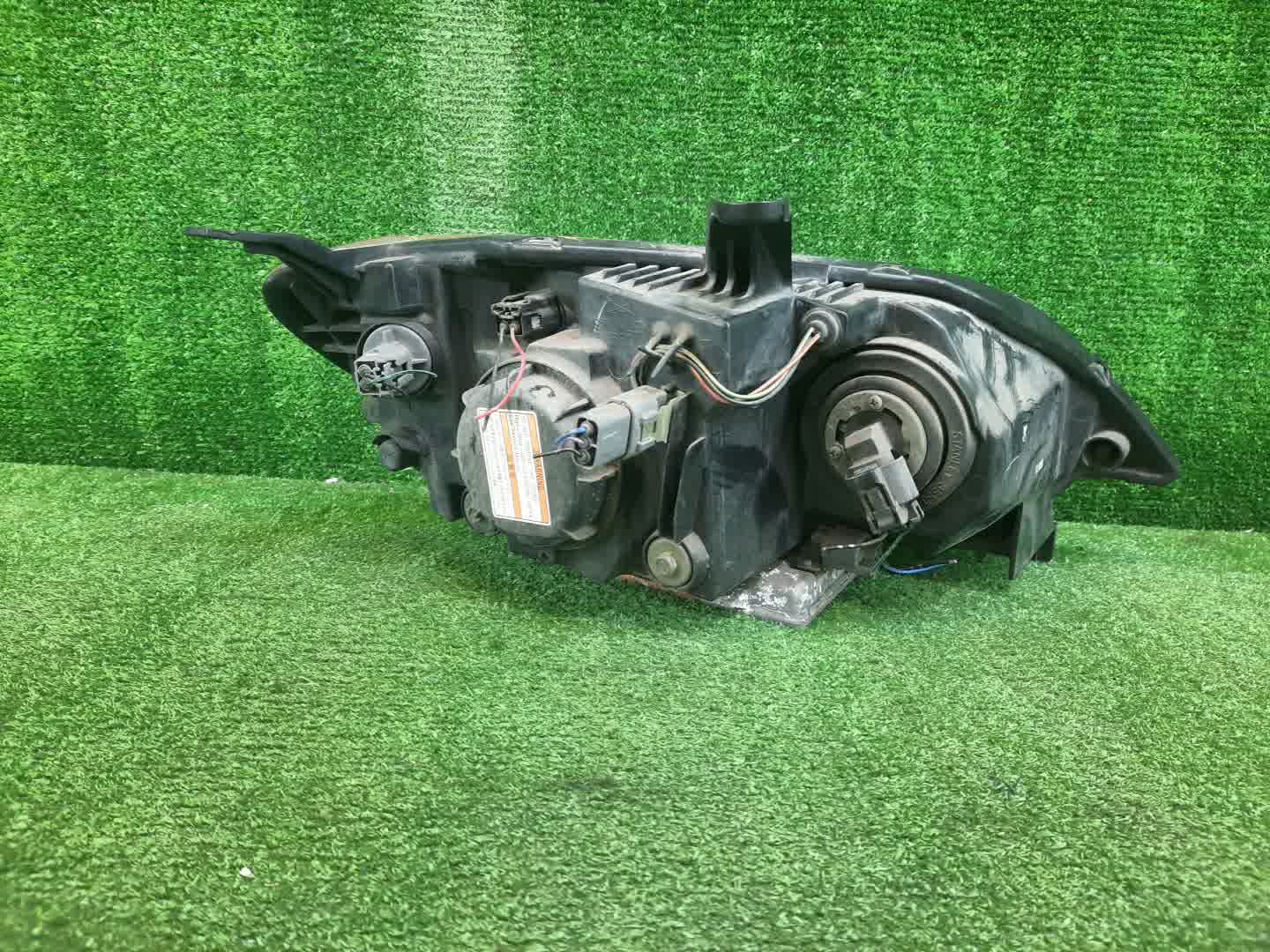 Фара левая передняя MAZDA DEMIO DY3W, DY5W, DY3R 2 ракурс