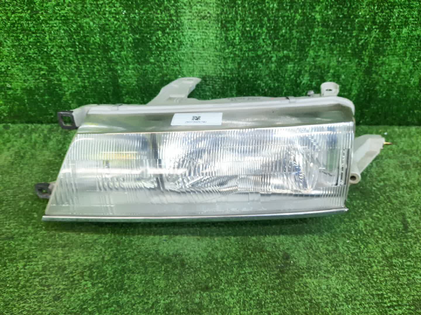 Фара левая передняя TOYOTA CORONA EXIV ST180 1 ракурс