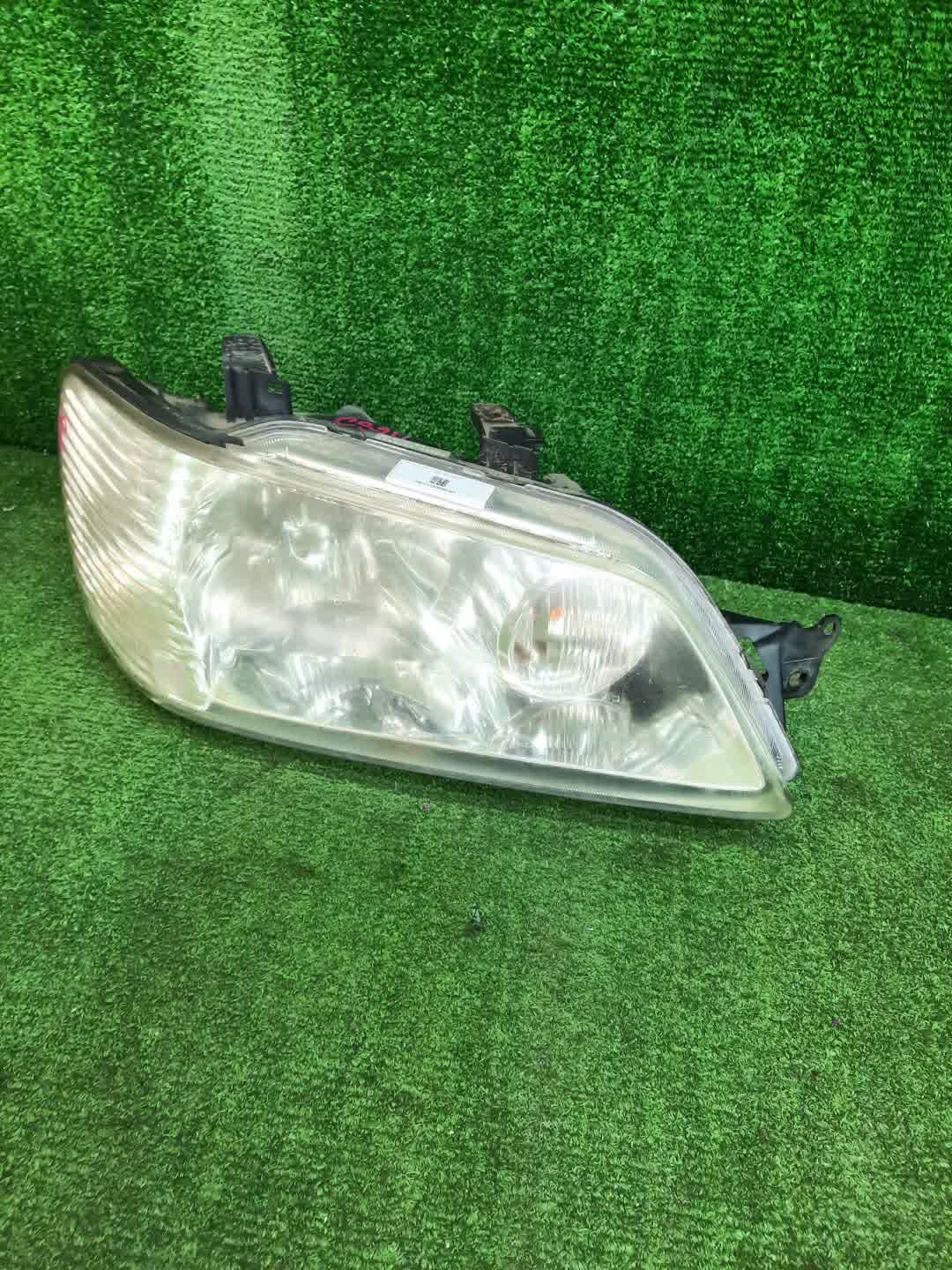 Фара правая передняя MITSUBISHI LANCER CEDIA, LANCER CS3W, CS9W, CS9A, CS1A, CS2A, CS2W, CS5W, CS5A, CS3A, CS6A, CS2V 1 ракурс