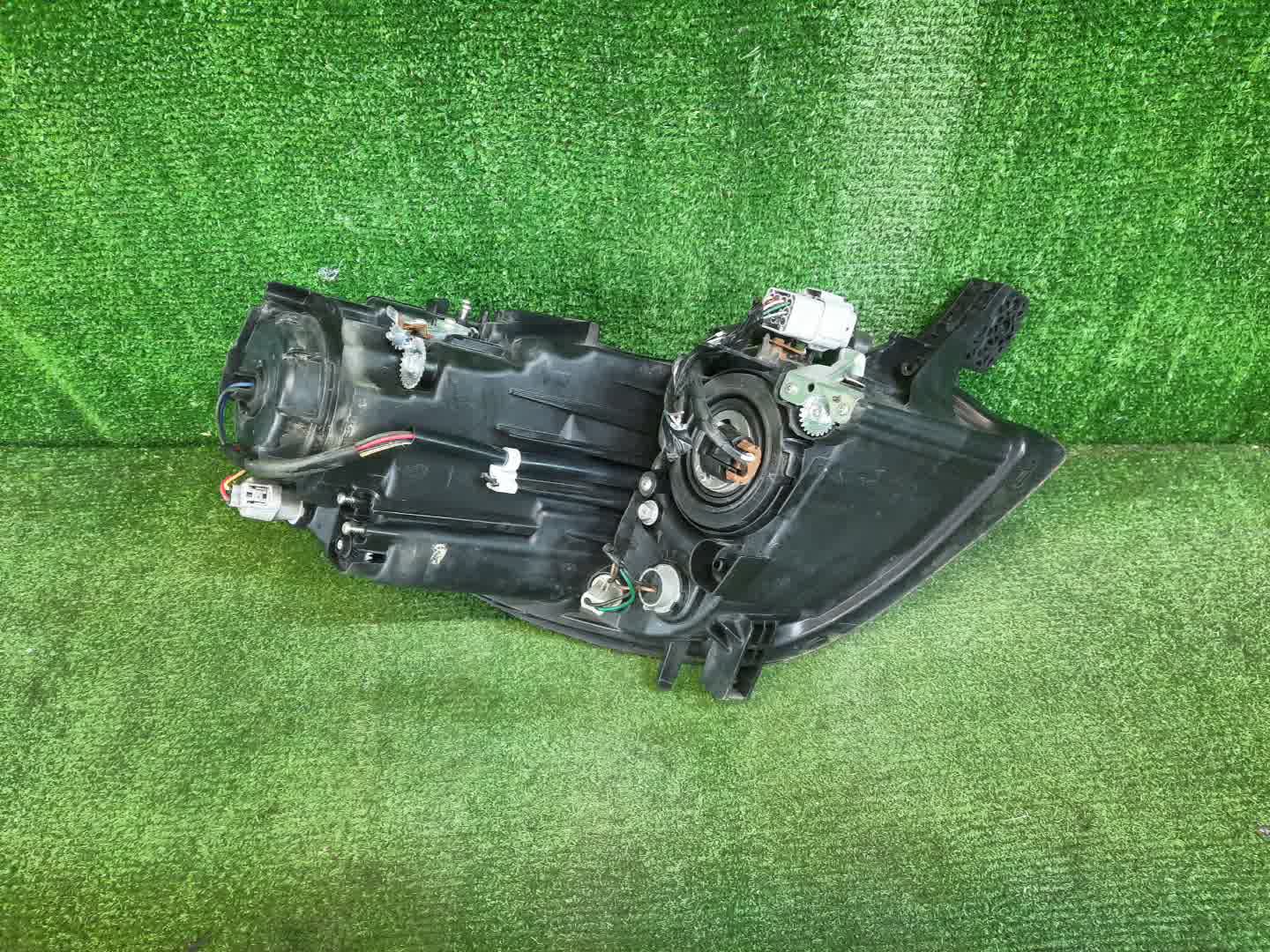 Фара левая передняя MITSUBISHI i HA1W 2 ракурс