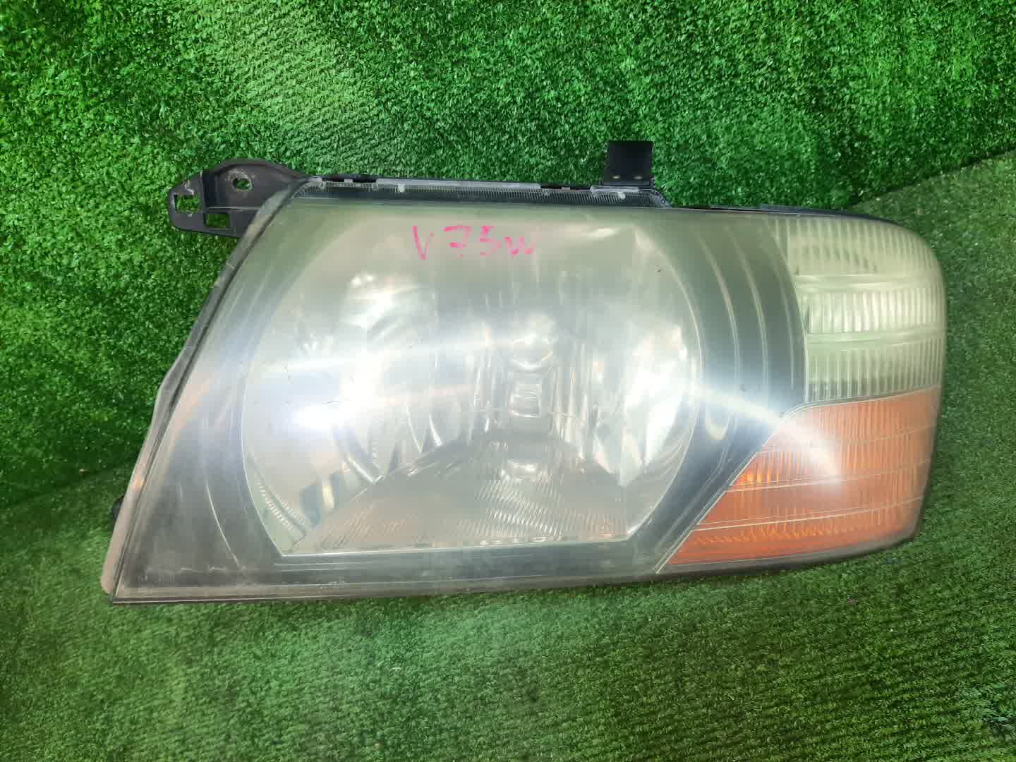 Фара левая передняя MITSUBISHI PAJERO V75W, V65W, V78W, V73W, V77W, V63W, V68W 1 ракурс