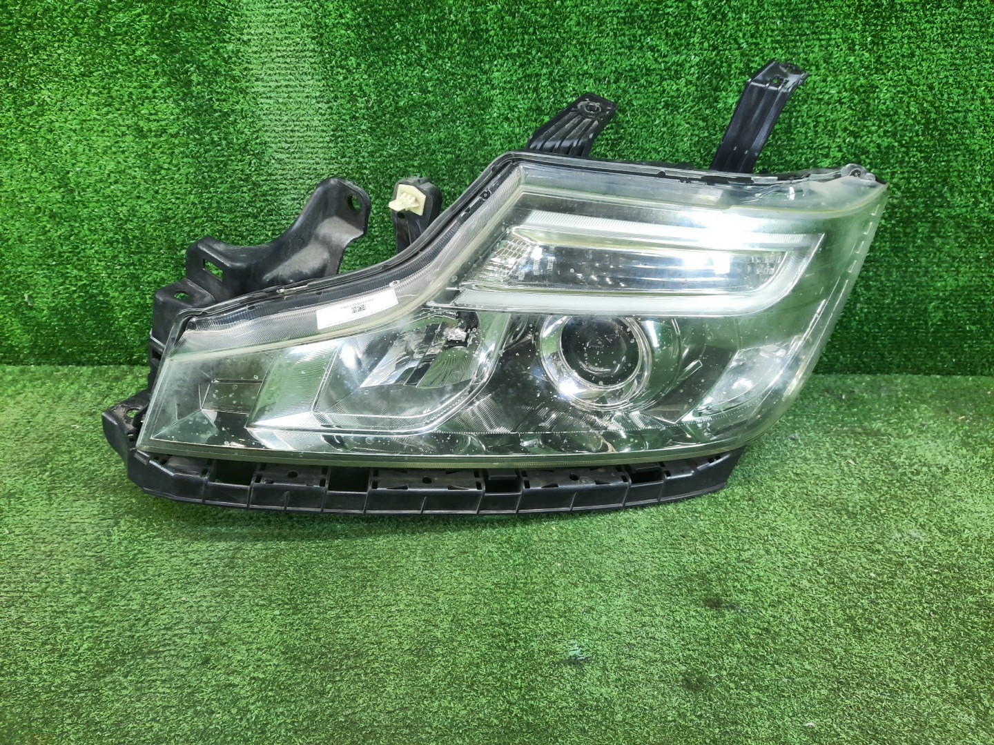Фара левая передняя HONDA STEPWGN RK5 1 ракурс