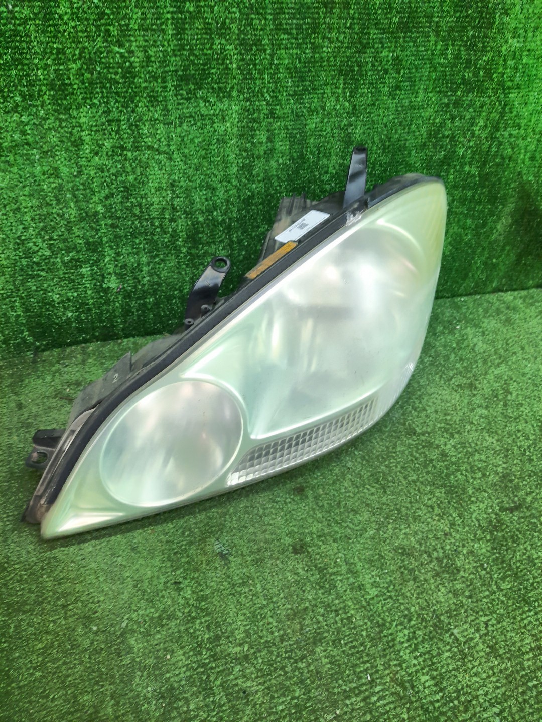 Фара левая передняя TOYOTA IPSUM ACM21W, ACM26W 1 ракурс Фара левая передняя TOYOTA IPSUM ACM21W, ACM26W 1 ракурс