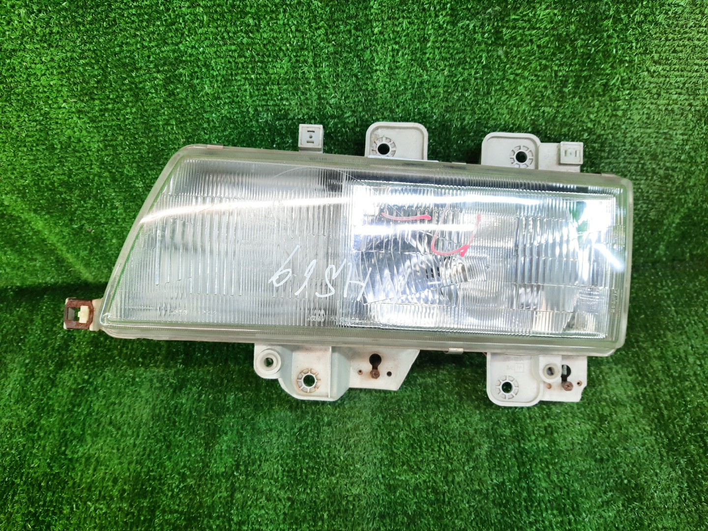 Фара левая передняя ISUZU ELF NKR69 1 ракурс