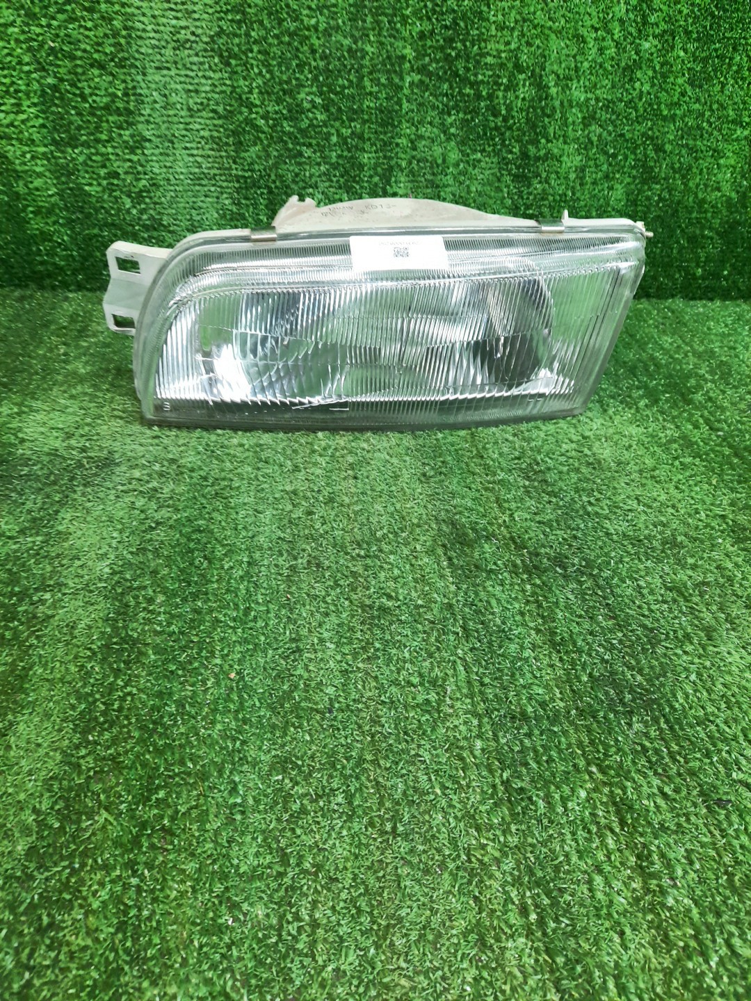 Фара левая передняя MITSUBISHI LIBERO CD2V, CD5W, CB8V, CB2W, CB2V, CB5W, CB8W, CD8V, CD8W, CB4W 1 ракурс Фара левая передняя MITSUBISHI LIBERO CD2V, CD5W, CB8V, CB2W, CB2V, CB5W, CB8W, CD8V, CD8W, CB4W 1 ракурс