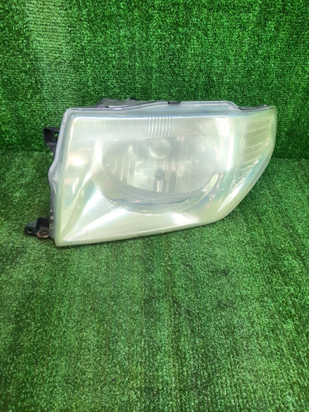 Фара левая передняя MITSUBISHI PAJERO IO H76W, H66W, H67W, H77W 1 ракурс
