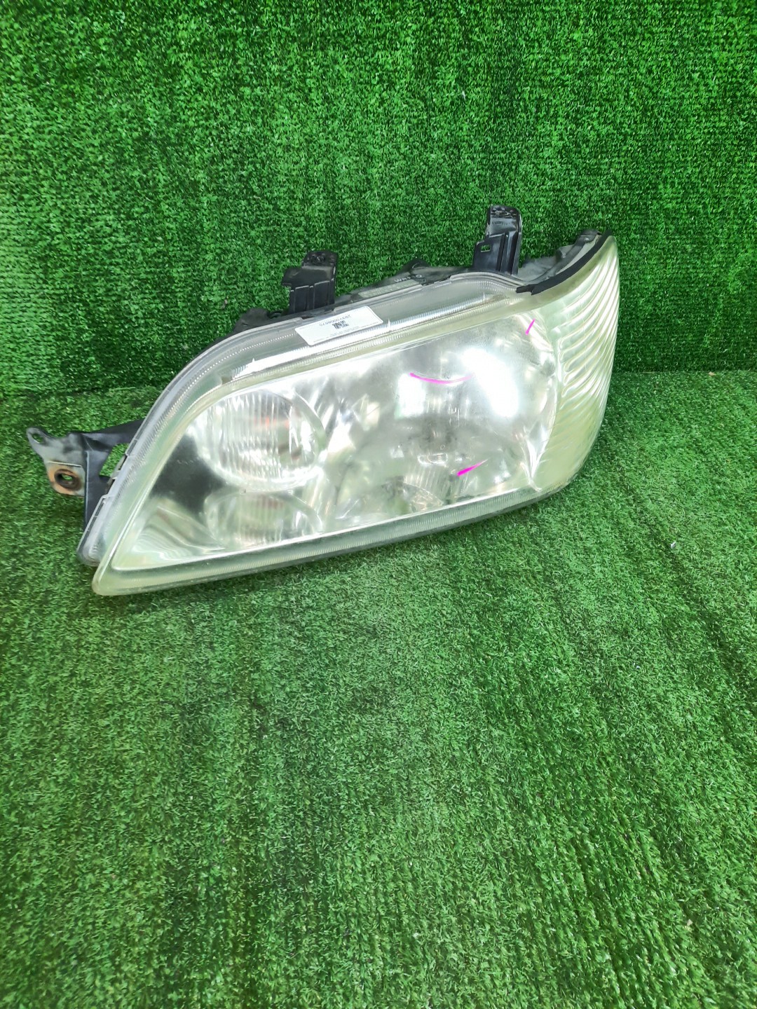 Фара левая передняя MITSUBISHI LANCER CEDIA, LANCER CS3W, CS9W, CS9A, CS1A, CS2A, CS2W, CS5W, CS5A, CS3A, CS6A, CS2V 1 ракурс