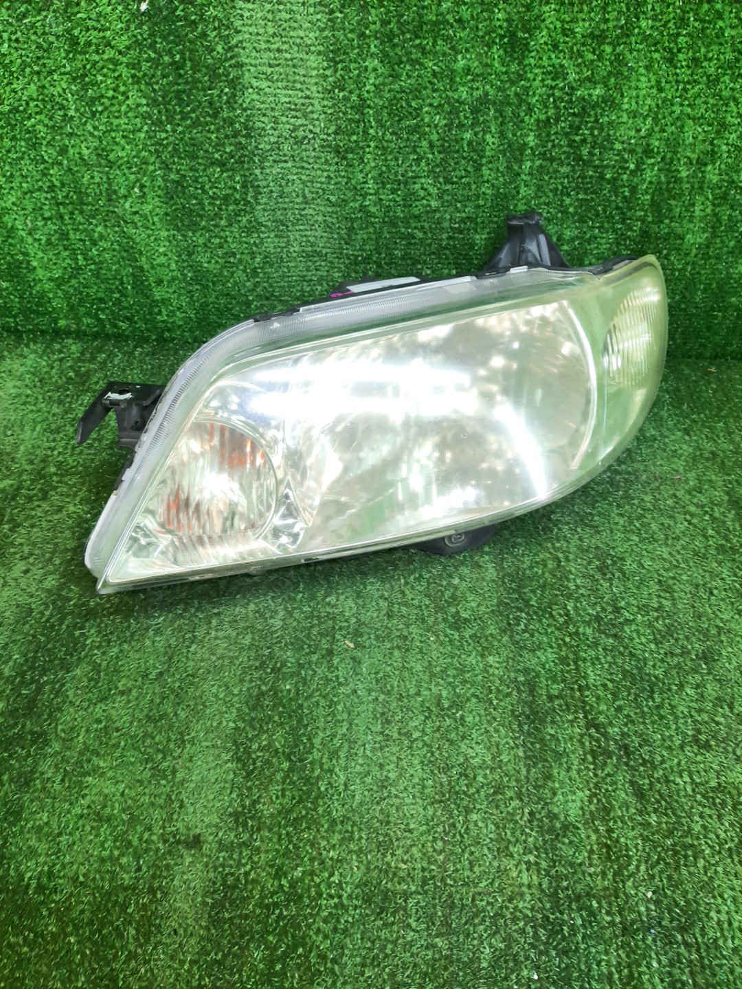 Фара левая передняя MAZDA FAMILIA, 323 BJ5W, BJ5P, BJEP, BJFW, BJ8W, BJ3P, BJFP, BJ 1 ракурс