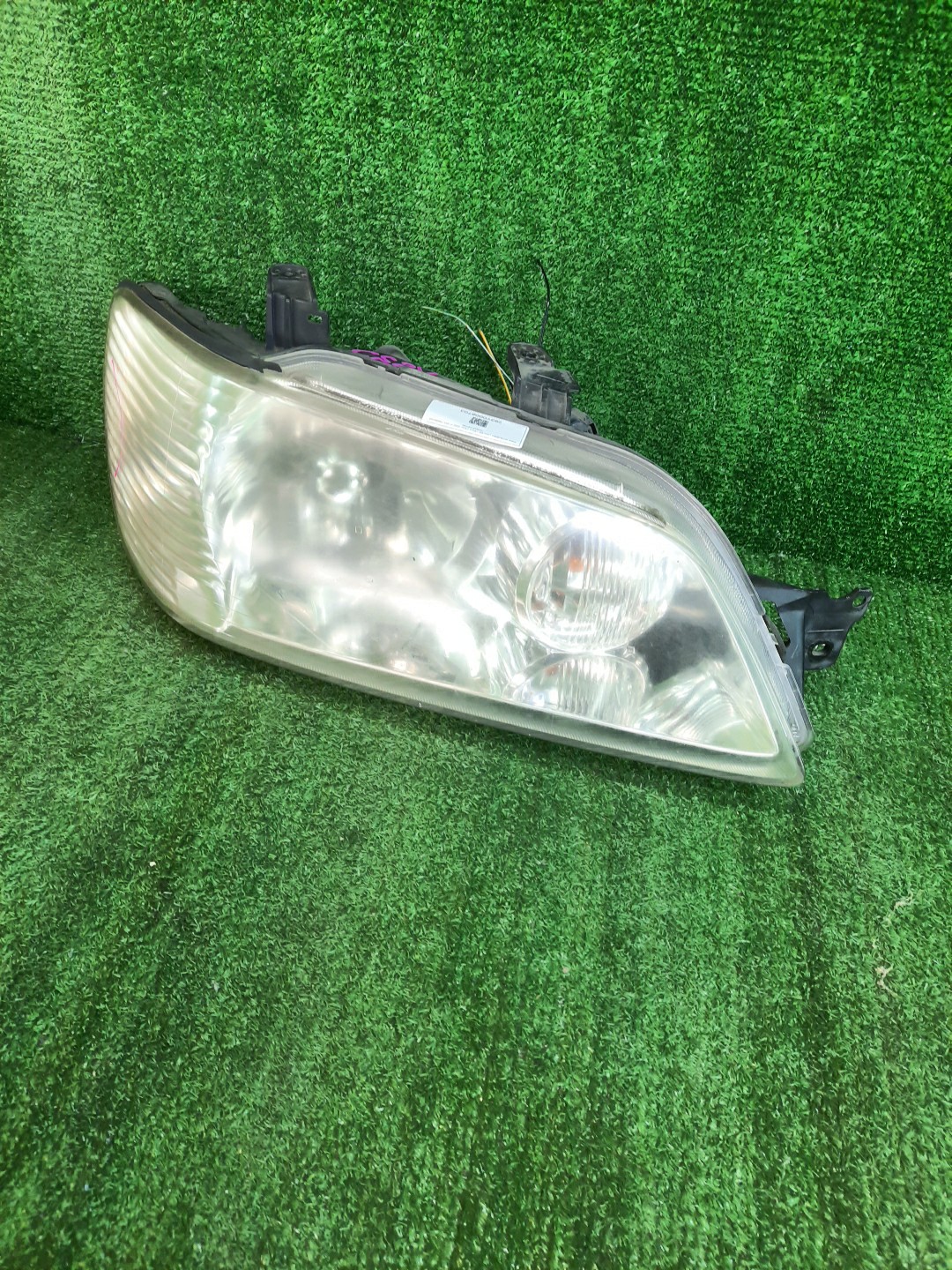 Фара правая передняя MITSUBISHI LANCER CEDIA, LANCER CS3W, CS9W, CS9A, CS1A, CS2A, CS2W, CS5W, CS5A, CS3A, CS6A, CS2V 1 ракурс