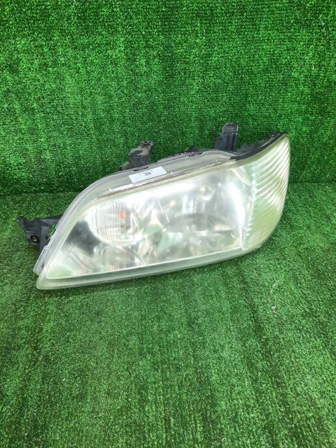 Фара левая передняя MITSUBISHI LANCER CEDIA, LANCER CS3W, CS9W, CS9A, CS1A, CS2A, CS2W, CS5W, CS5A, CS3A, CS6A, CS2V 1 ракурс
