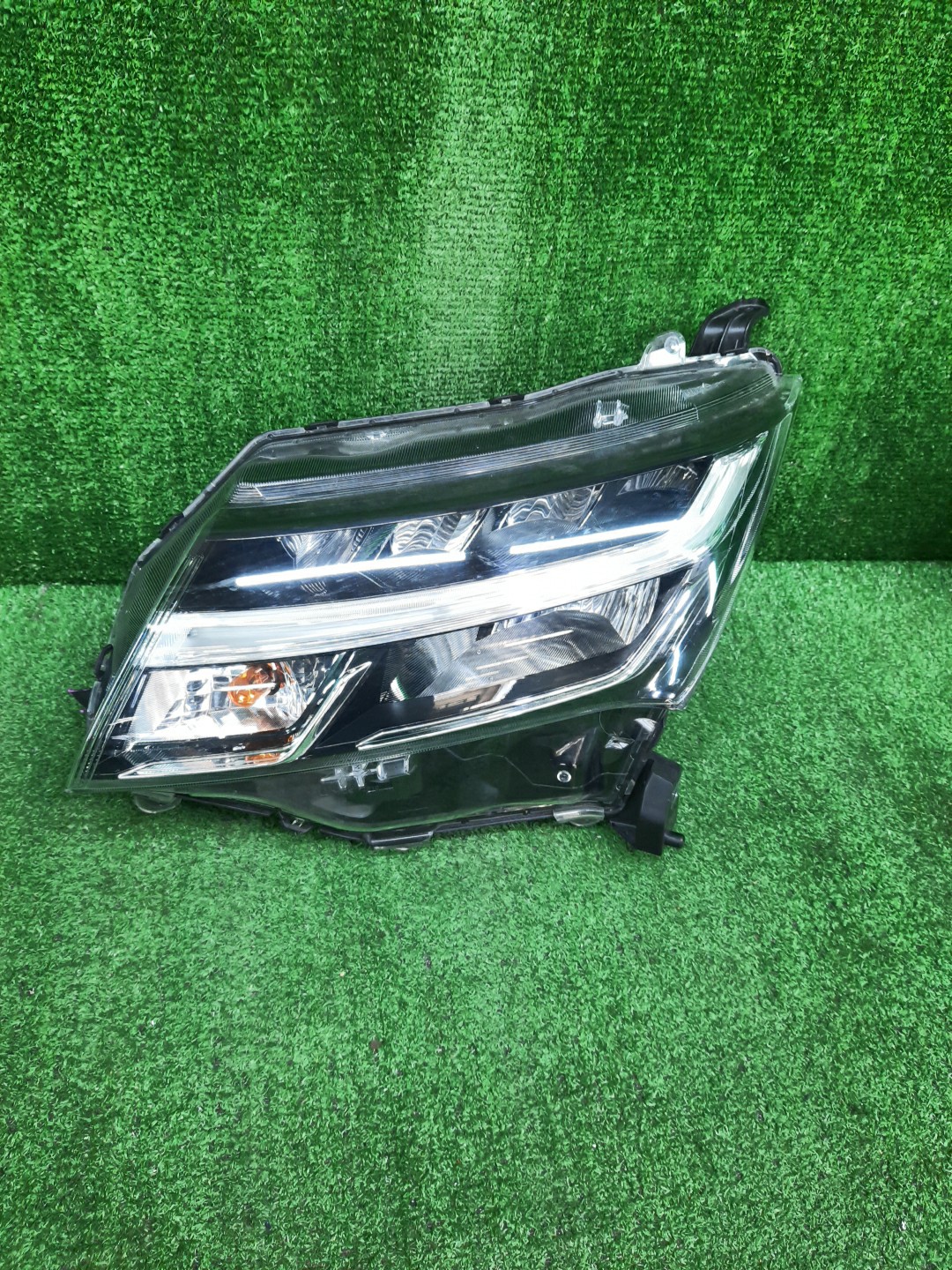 Фара левая передняя TOYOTA THOR, JUSTY, TANK, ROOMY M910S, M900S, M900F, M910F, M910A, M900A 1 ракурс