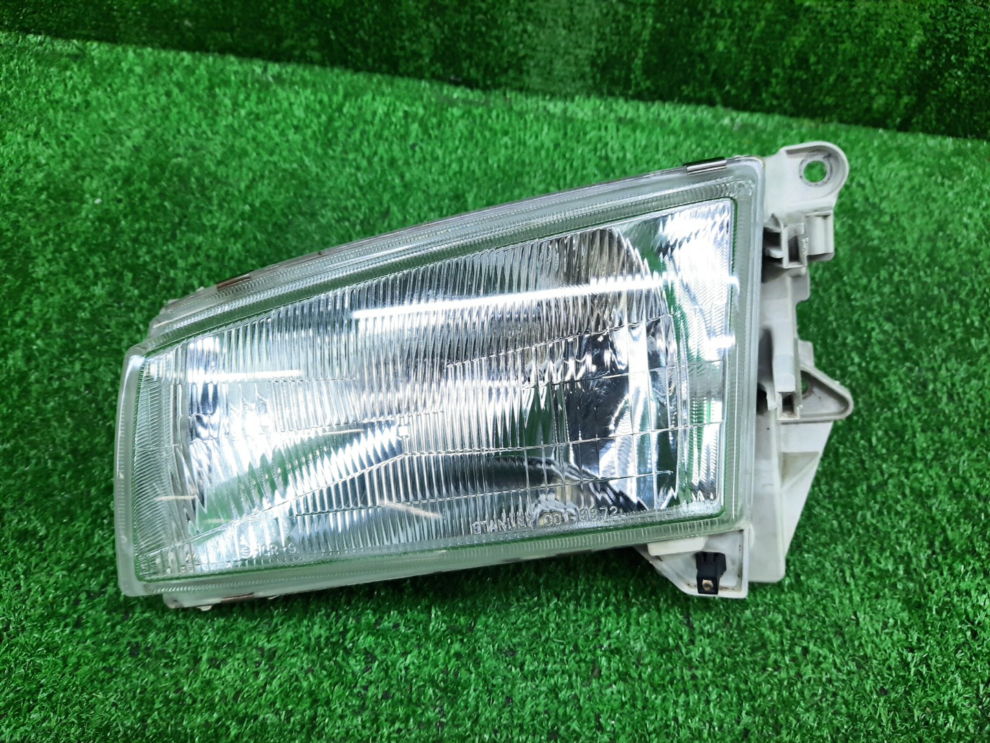 Фара левая передняя MAZDA DEMIO DW3W, DW5W 1 ракурс