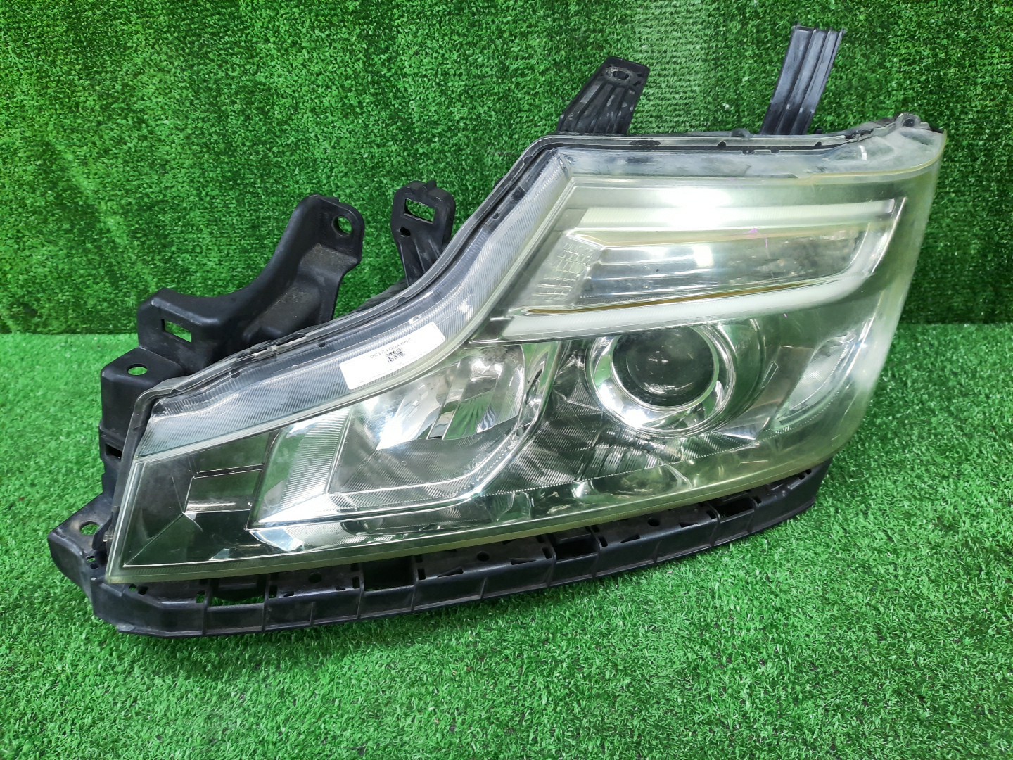 Фара левая передняя HONDA STEPWGN RK5 1 ракурс