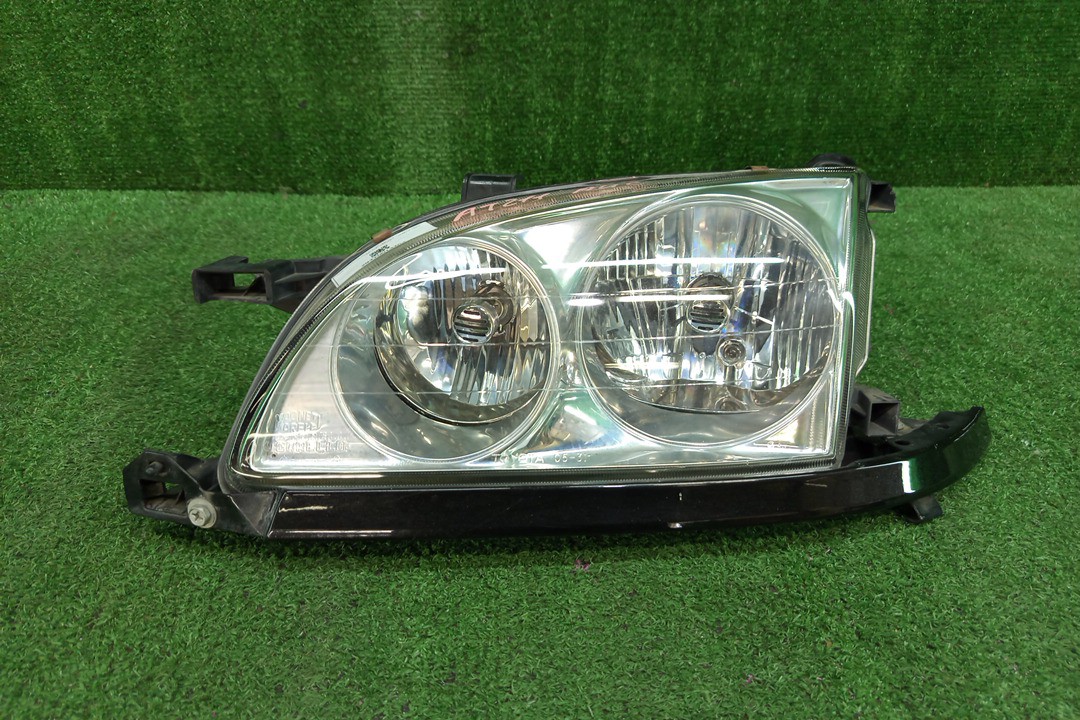 Фара левая передняя TOYOTA CALDINA ST215W, ST210G, ST215G, CT216, ST210, AT211, ST215, CT216G, AT211G 1 ракурс