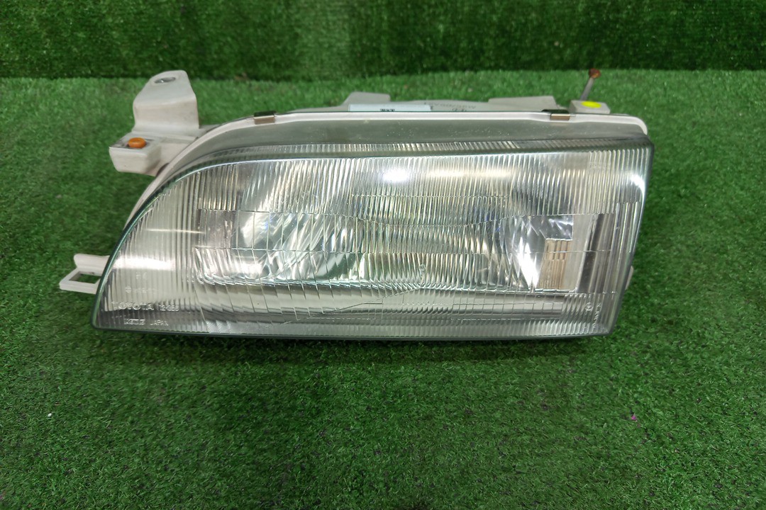 Фара левая передняя TOYOTA COROLLA AE100, AE101, AE109, EE101, EE102, EE103, EE104, AE104, CE107, EE107, CE100, CE106, EE106, CE102, CE104, CE109, CE105, EE108 1 ракурс
