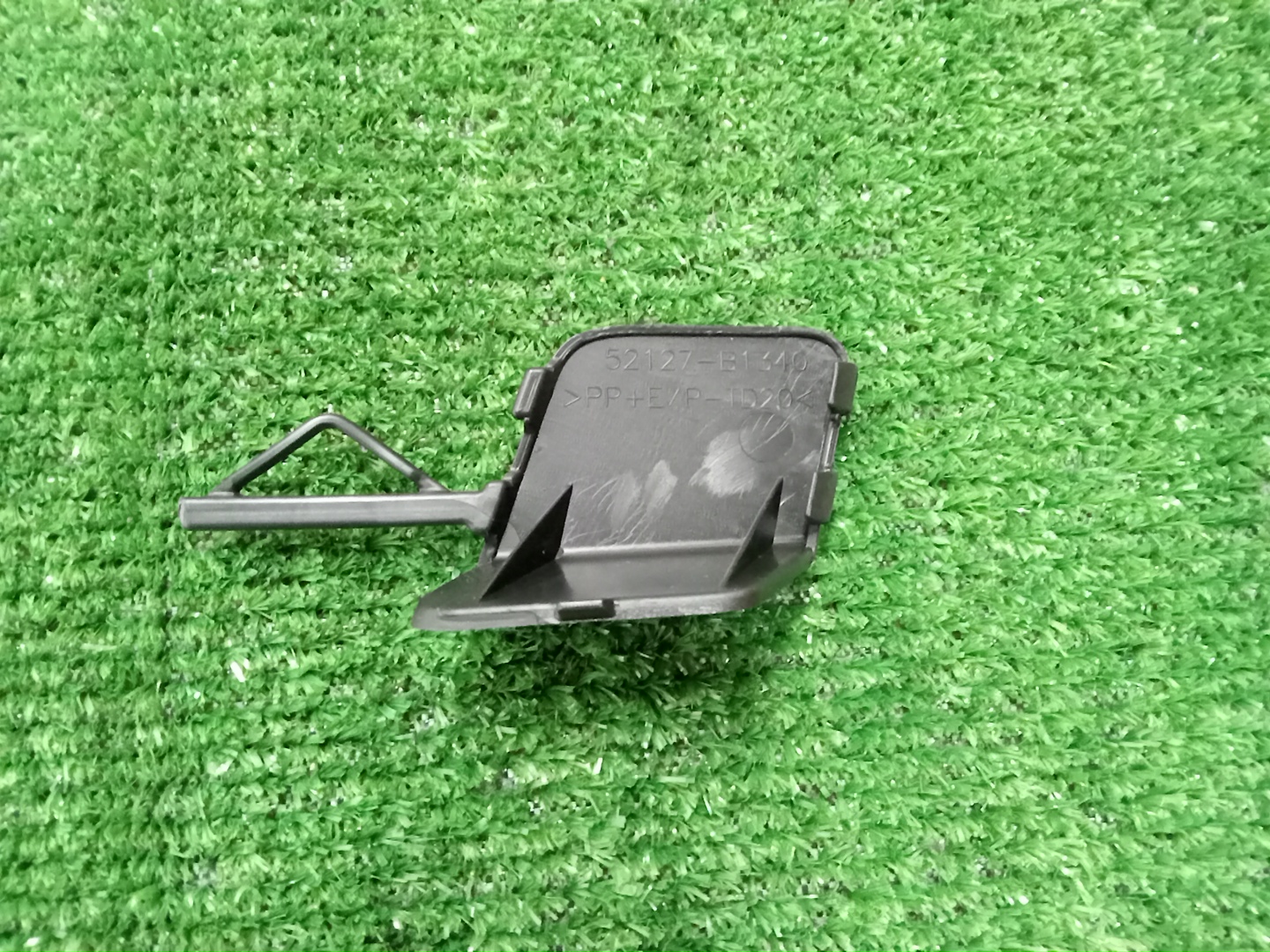 Заглушка бампера правая передняя TOYOTA RAIZE A210A 52127-B1340 2 ракурс