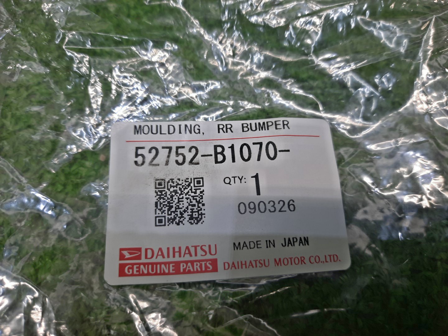 Заглушка бампера правая задняя DAIHATSU ROCKY A210S 52752-B1070 4 ракурс
