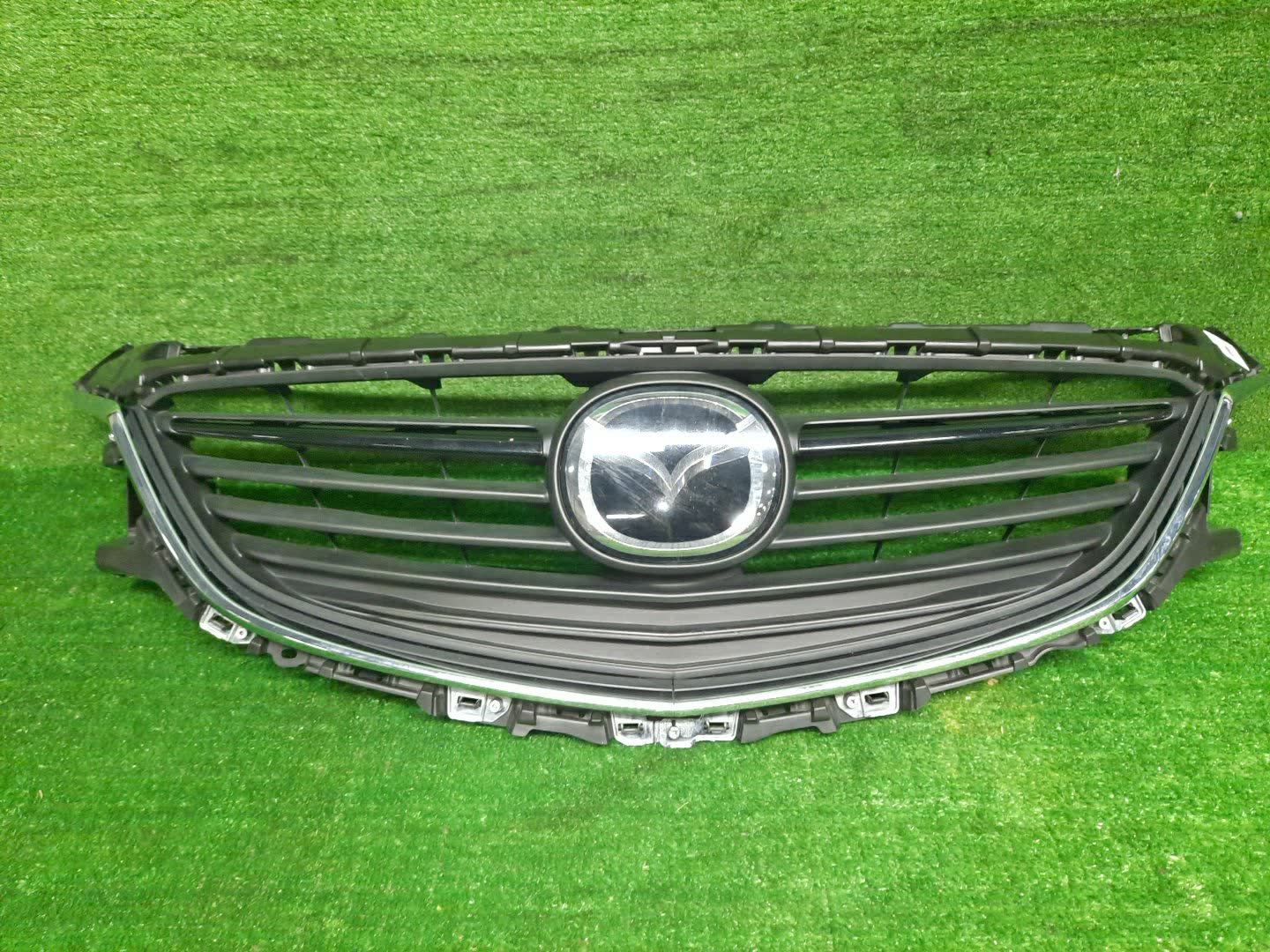 Решетка радиатора MAZDA ATENZA, MAZDA 6 GJ5FP, GJEFP, GJ2FP, GJ2AP, GJ526, GJ523 GHP9-50712 1 ракурс
