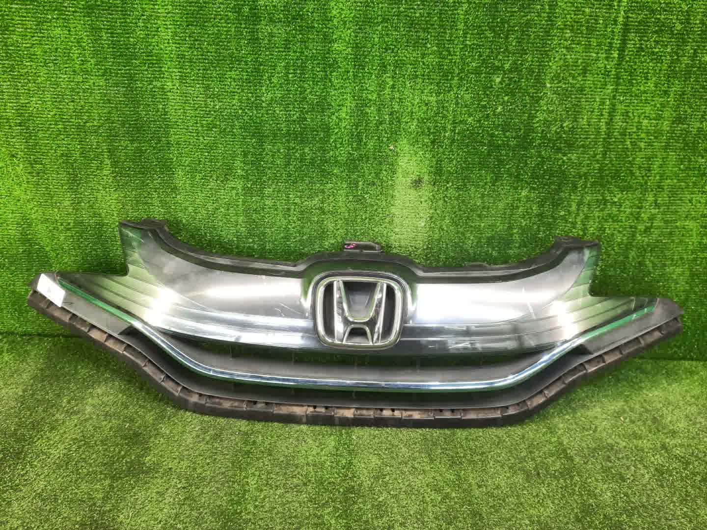 Решетка радиатора HONDA FIT GK6, GK3, GK5, GK4 71121-T5C-003 1 ракурс