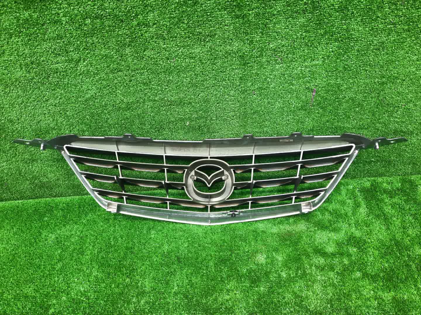 Решетка радиатора передняя MAZDA MILLENIA TAFP T060B0711 4 ракурс