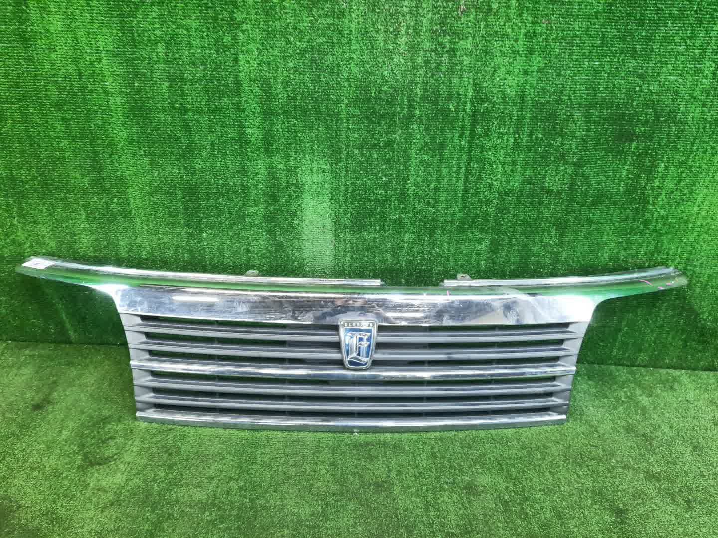 Решетка радиатора NISSAN ELGRAND ATE50, AVE50, ATWE50, ALWE50, APWE50, AVWE50, APE50, ALE50 62310-VE000 1 ракурс