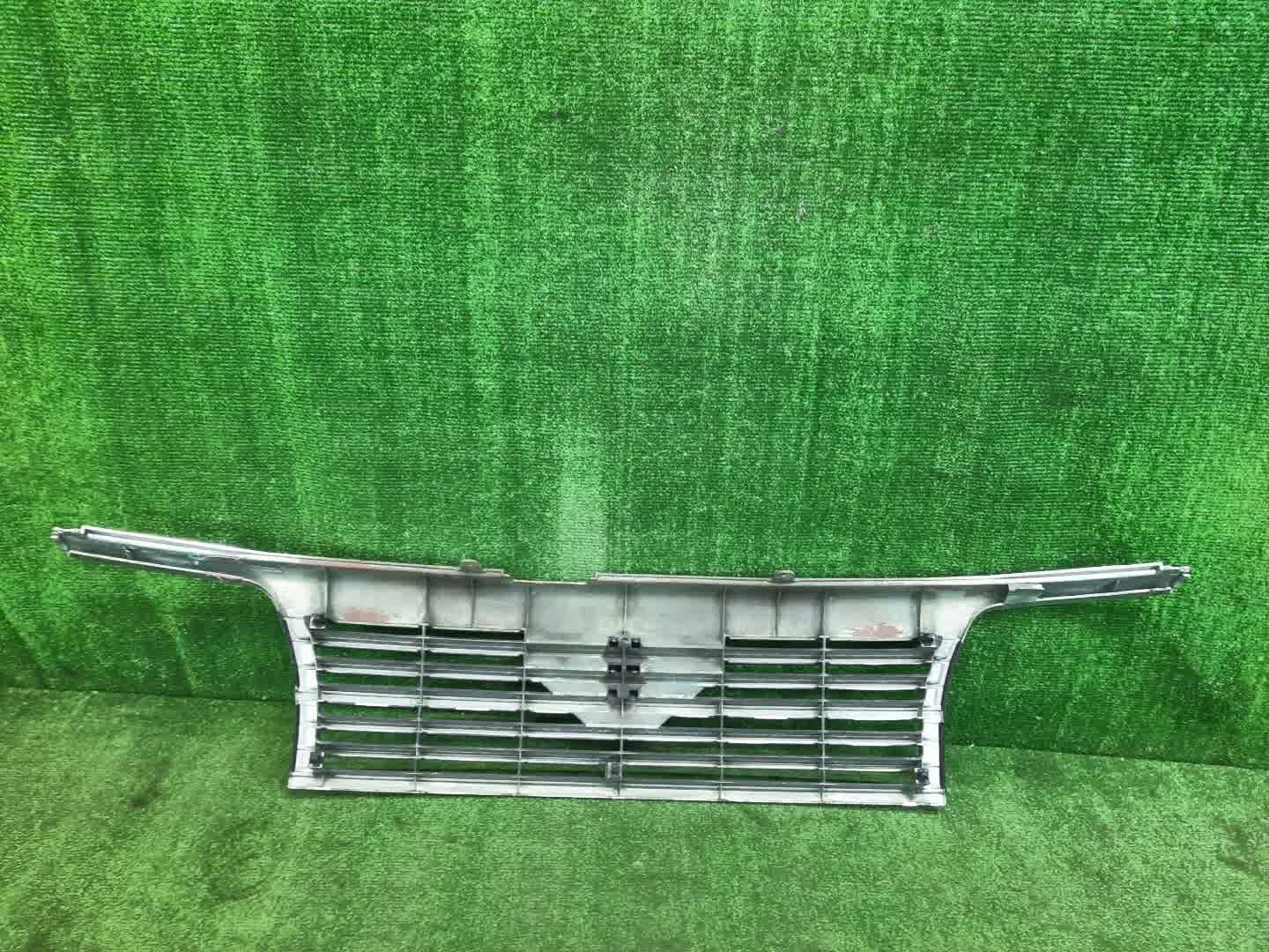 Решетка радиатора NISSAN ELGRAND ATE50, AVE50, ATWE50, ALWE50, APWE50, AVWE50, APE50, ALE50 62310-VE000 5 ракурс