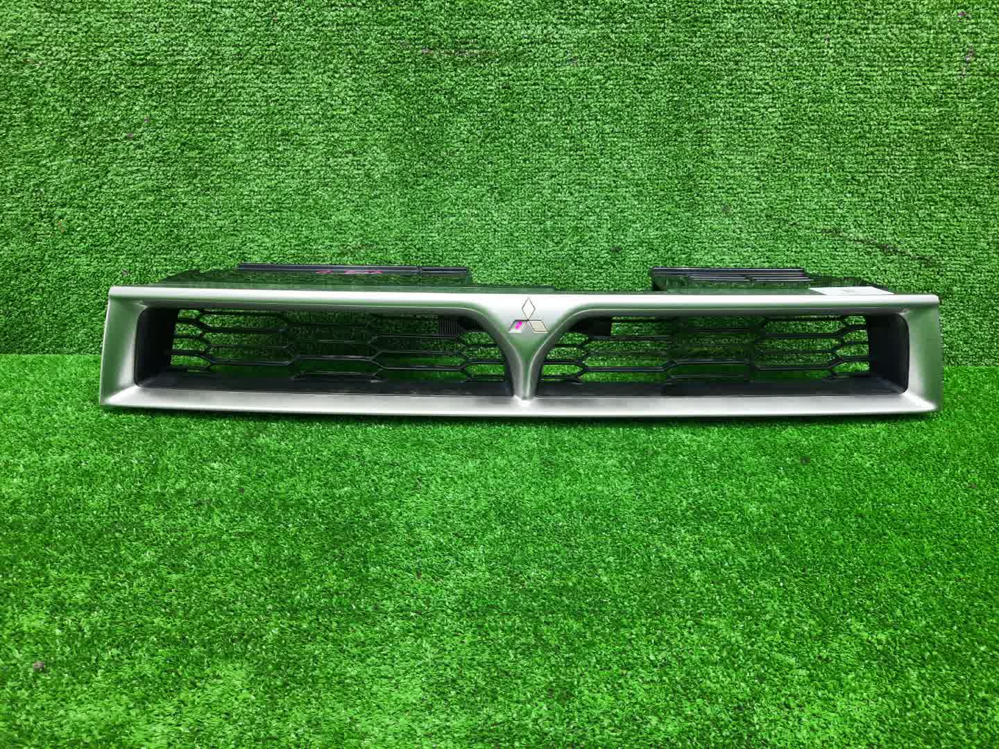 Решетка радиатора MITSUBISHI GALANT, LEGNUM EA1A, EA7A, EC1A, EC7A, EC3A, EC5A, EA3A, EC1W, EC5W, EA1W, EA3W, EA4W, EC3W, EC4W 1 ракурс Решетка радиатора MITSUBISHI GALANT, LEGNUM EA1A, EA7A, EC1A, EC7A, EC3A, EC5A, EA3A, EC1W, EC5W, EA1W, EA3W, EA4W, EC3W, EC4W 1 ракурс