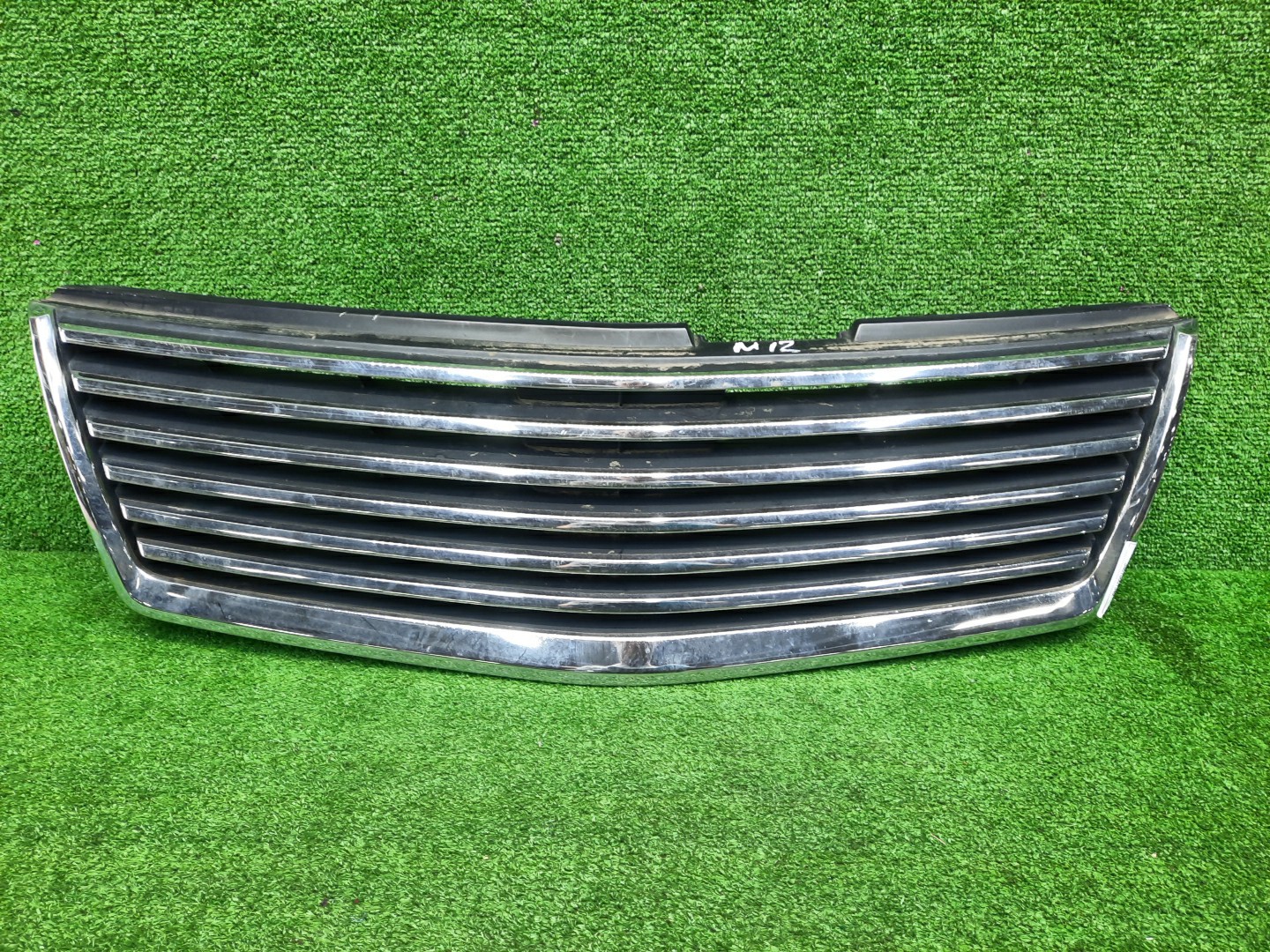 Решетка радиатора NISSAN LIBERTY RM12 62310-1A284 1 ракурс