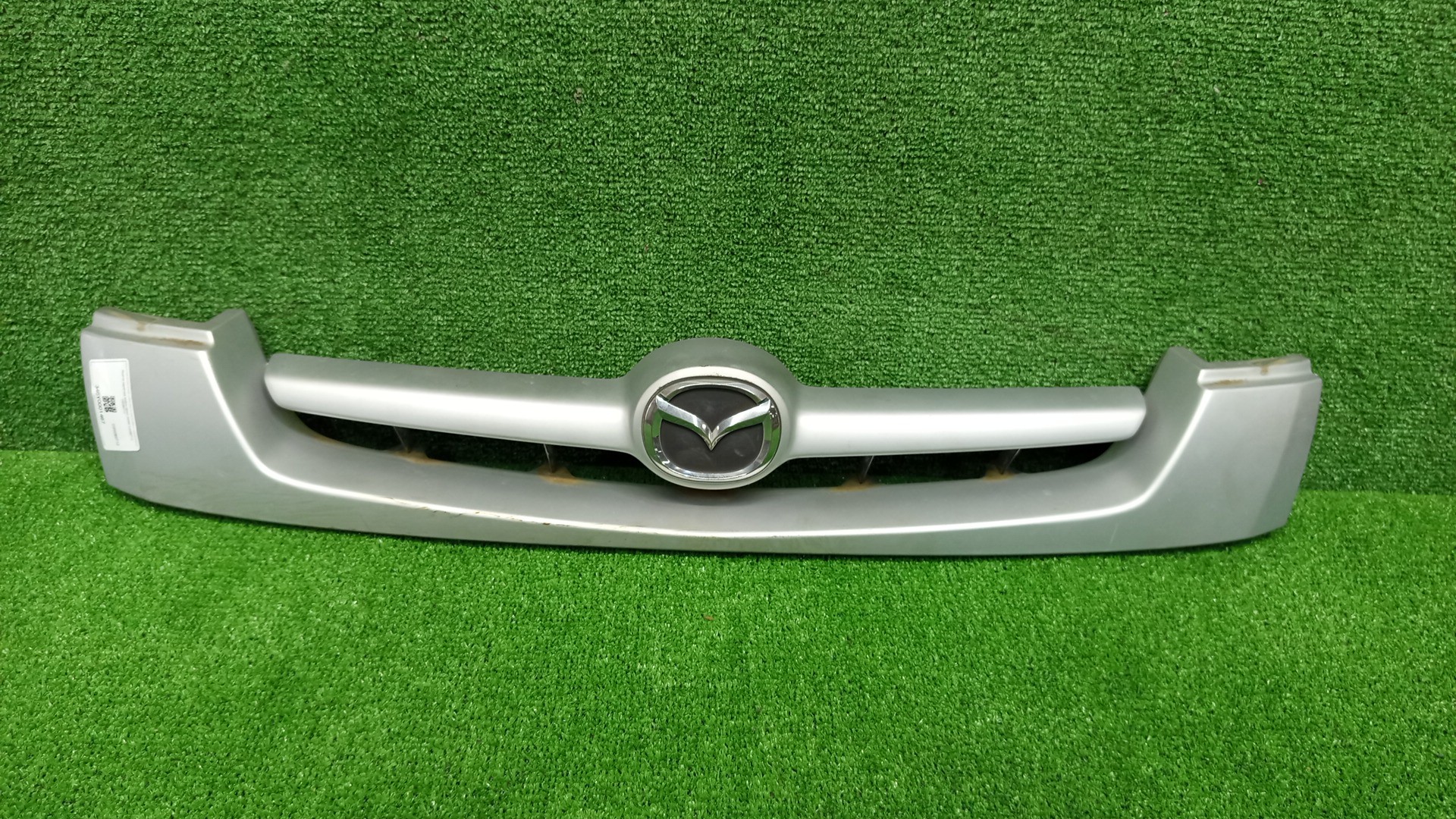 Решетка радиатора MAZDA DEMIO DW3W, DW5W D202B0712 1 ракурс
