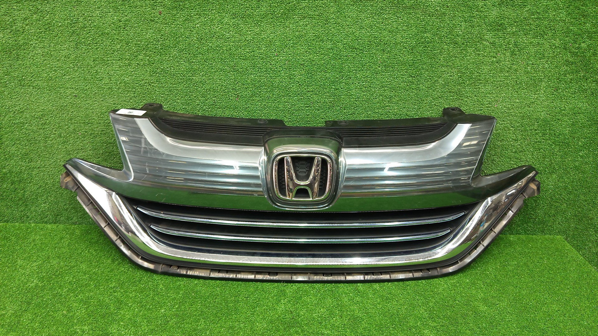 Решетка радиатора HONDA FREED+, FREED GB5, GB6, GB7, GB8 71106-TDK 1 ракурс