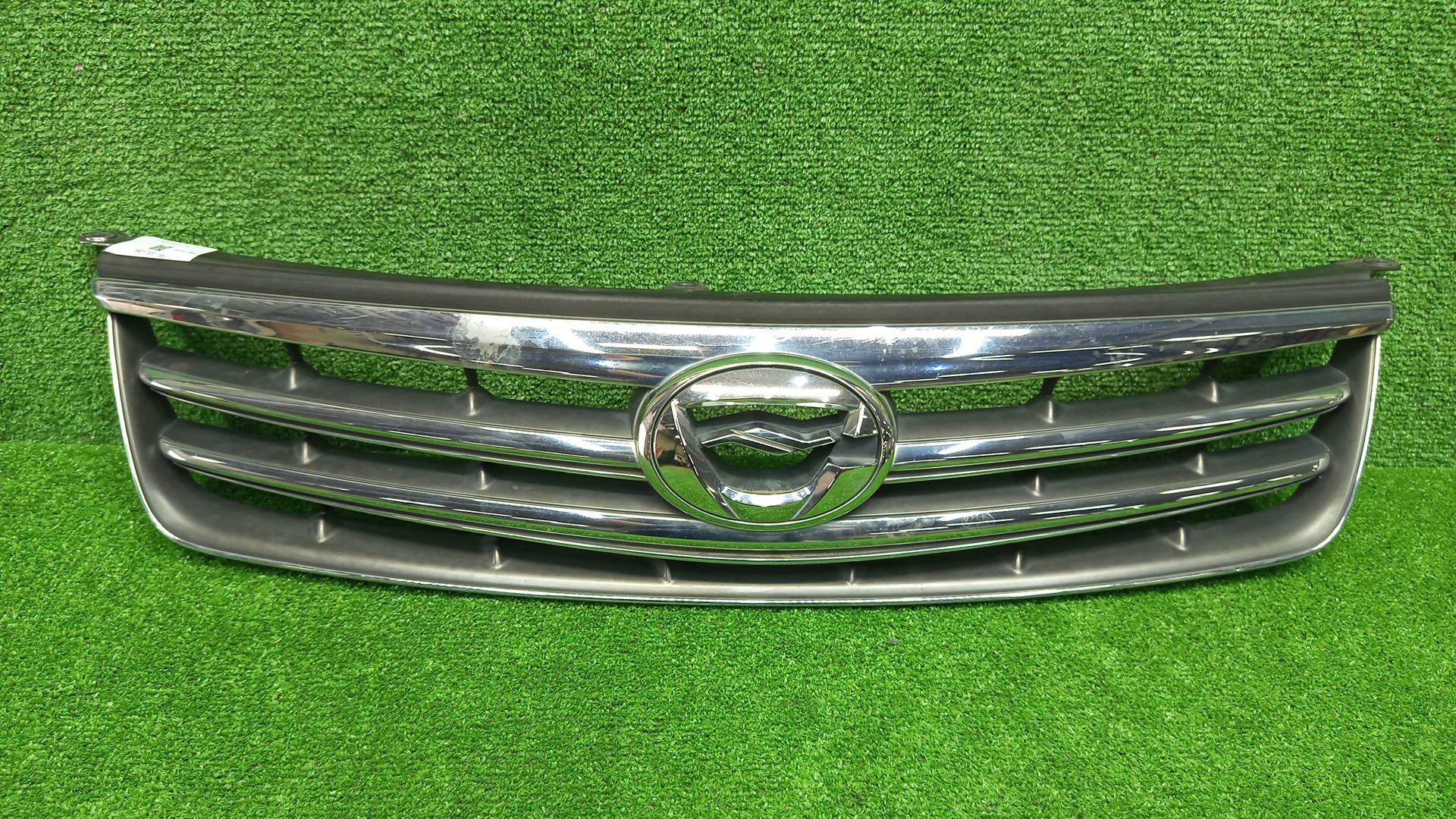 Решетка радиатора TOYOTA COROLLA  AXIO NZE141 53101-12B40 1 ракурс