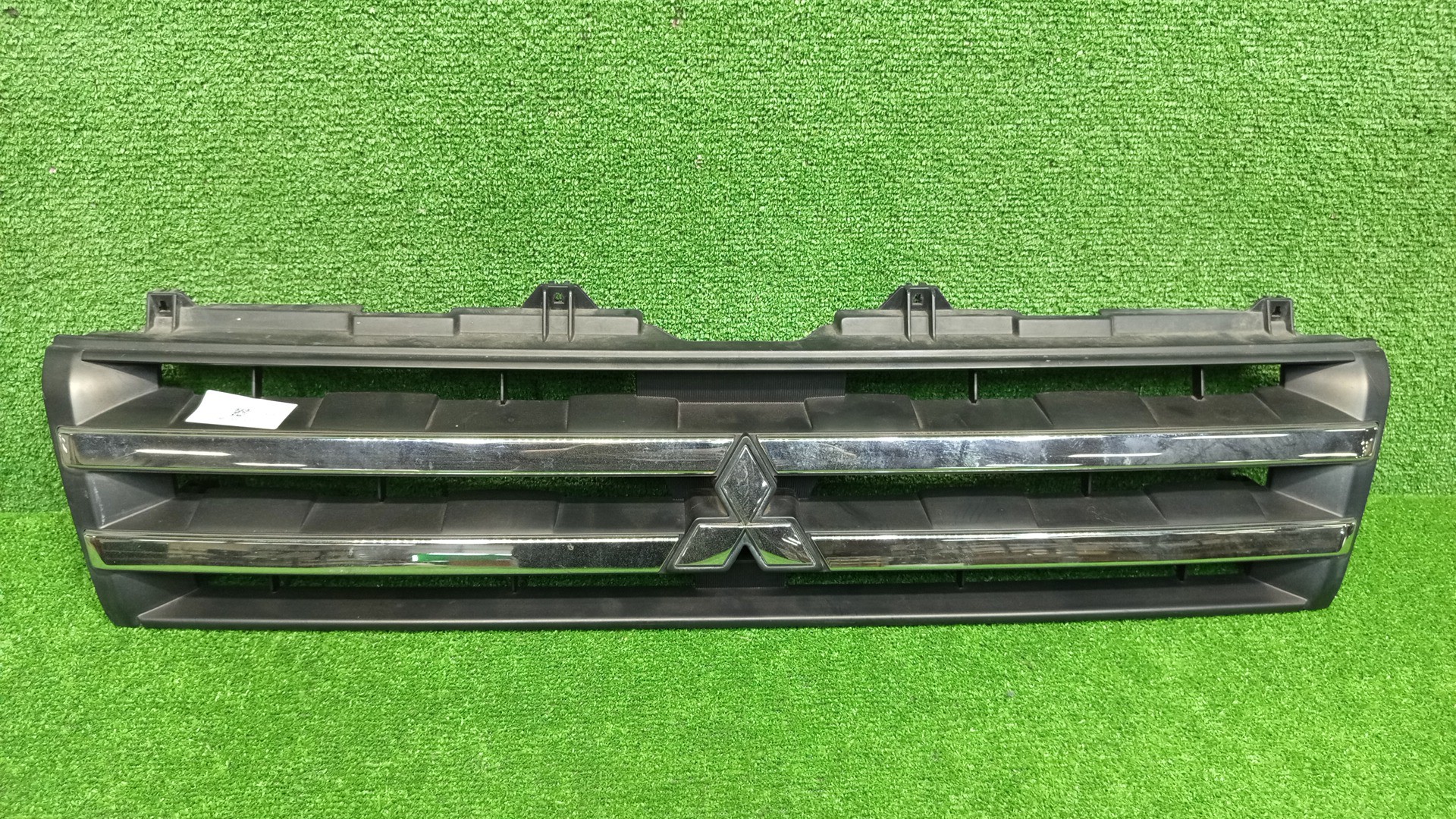 Решетка радиатора MITSUBISHI PAJERO MINI H58A, H53A 7450A213 1 ракурс Решетка радиатора MITSUBISHI PAJERO MINI H58A, H53A 7450A213 1 ракурс