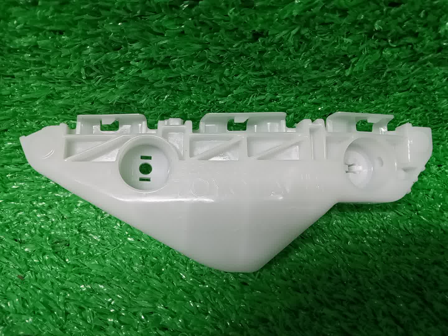 Крепление бампера левое переднее TOYOTA BELTA NCP96, KSP92, SCP92 52536-52141 1 ракурс