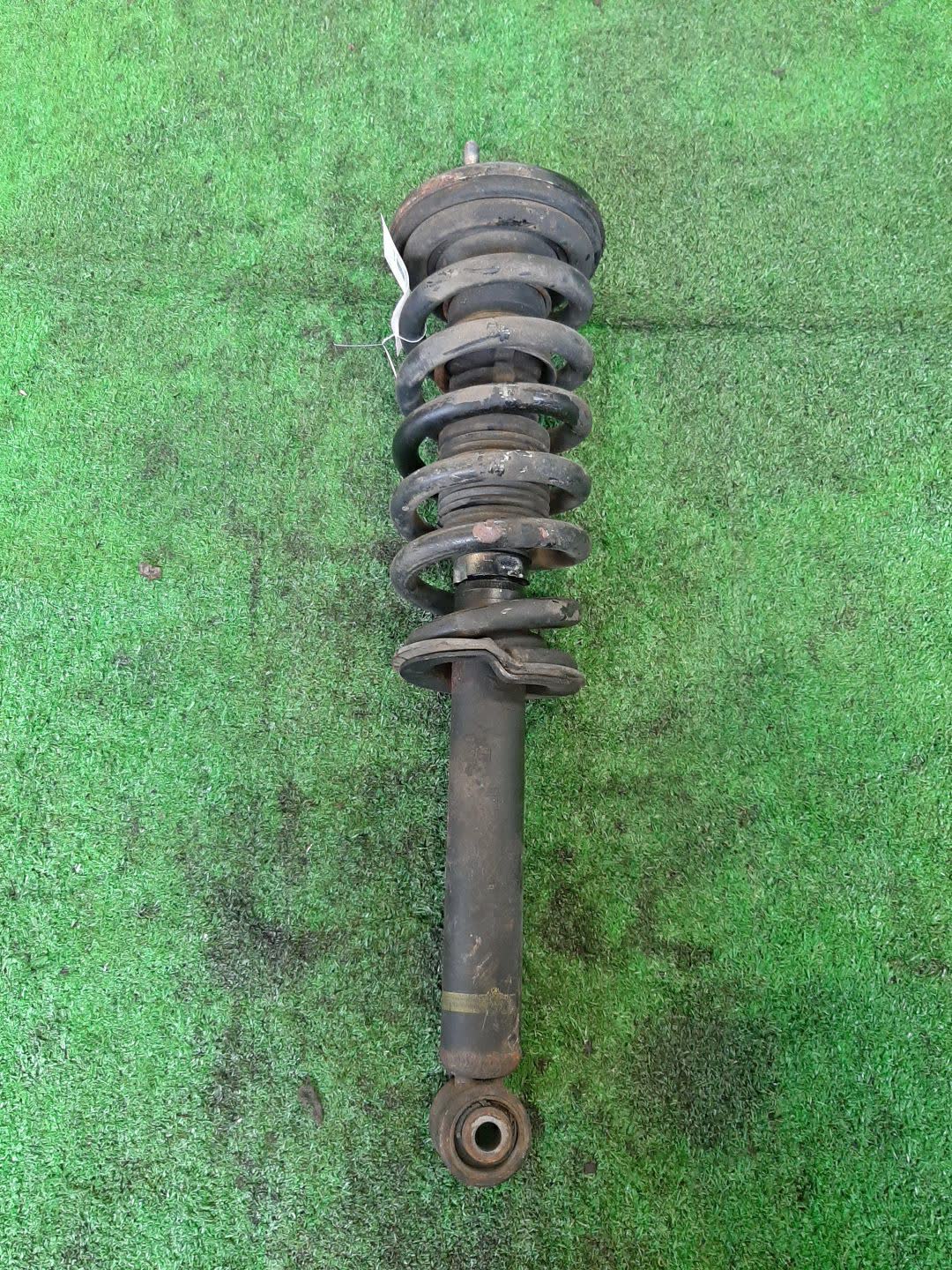 Стойка левая передняя MITSUBISHI PAJERO V75W, V65W, V78W, V73W, V77W, V63W, V68W 6G74, 4M41T, 6G72, 6G75 1 ракурс
