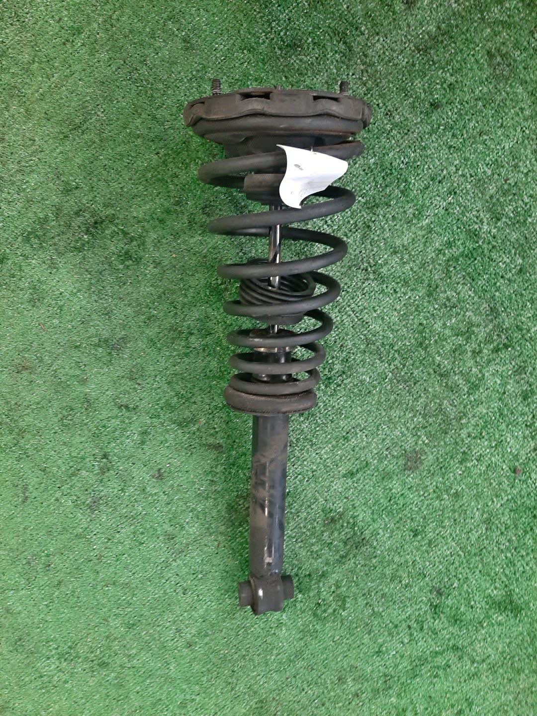 Стойка левая передняя NISSAN BLUEBIRD, PRIMERA QU14, HU14, EU14, P11, WP11, QP11, WQP11, WHP11 QG18DE, QG18DD, SR20DE, SR20VE, SR18DE 1 ракурс