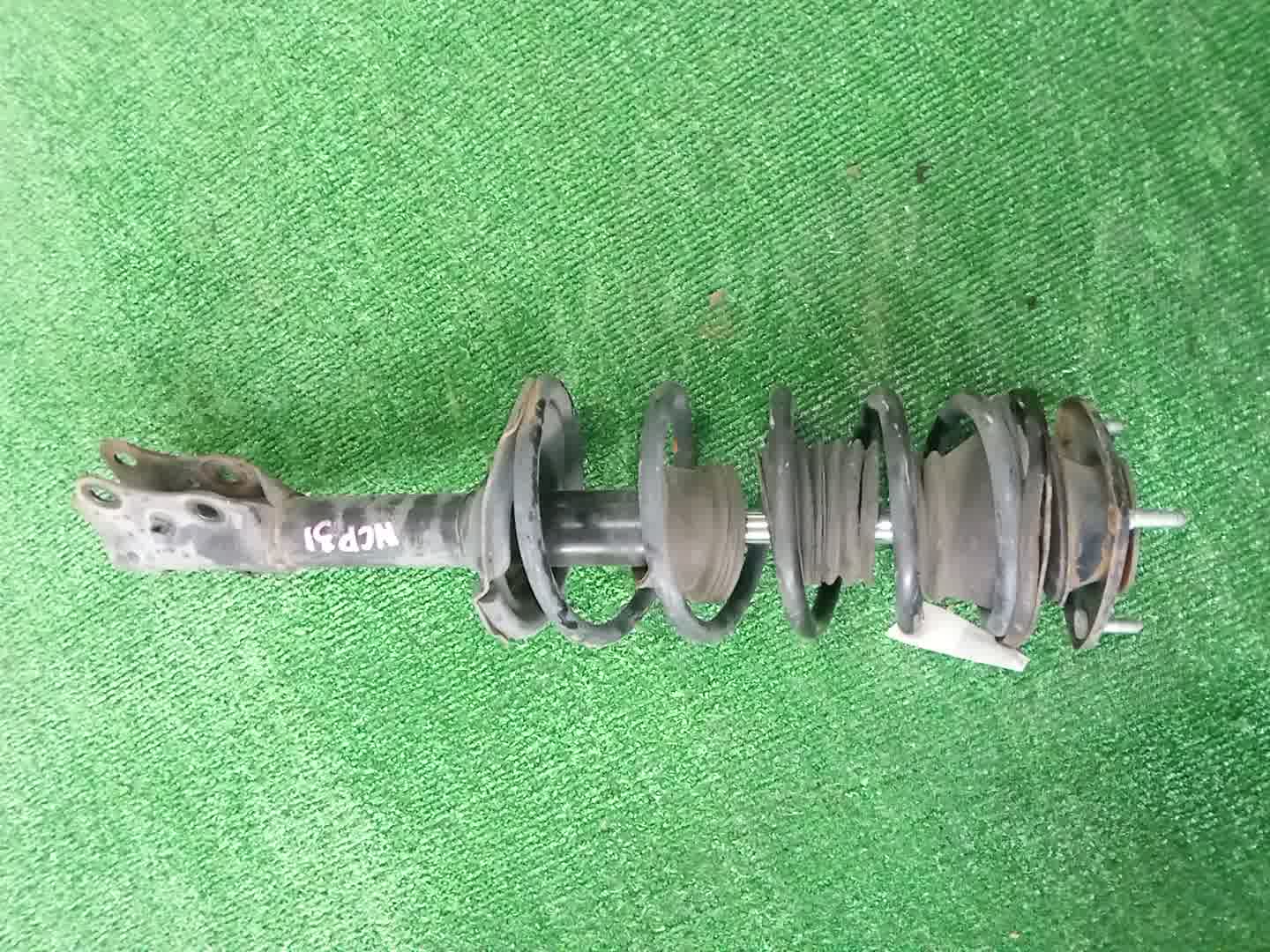 Стойка левая передняя TOYOTA FUNCARGO, IST, PLATZ, RAUM, VITZ, WILL VI, PROBOX, BB, PORTE, SUCCEED, WILL CYPHA NCP20, NCP21, NCP60, NCP61, NCP12, SCP11, NCZ20, SCP10, NCP10, SCP13, NCP13, NCP19, NCP51V, NCP58G, NCP50V, NLP51, NCP52V, NCP30, NCP31, NC