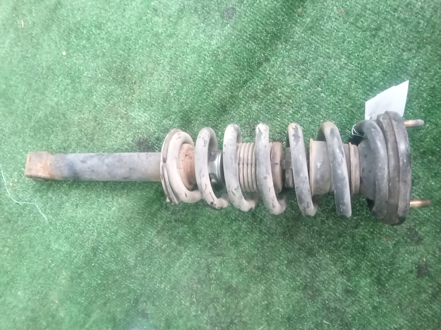 Стойка левая передняя MITSUBISHI PAJERO V75W, V65W, V78W, V73W, V77W, V63W, V68W 6G74, 4M41T, 6G72, 6G75 1 ракурс