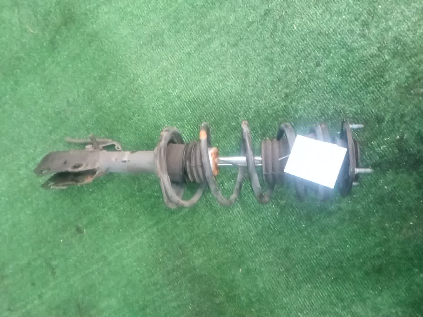 Стойка левая передняя TOYOTA FUNCARGO, IST, PLATZ, RAUM, VITZ, WILL VI, PROBOX, BB, PORTE, SUCCEED, WILL CYPHA NCP20, NCP21, NCP60, NCP61, NCP12, SCP11, NCZ20, SCP10, NCP10, SCP13, NCP13, NCP19, NCP51V, NCP58G, NCP50V, NLP51, NCP52V, NCP30, NCP31, NC