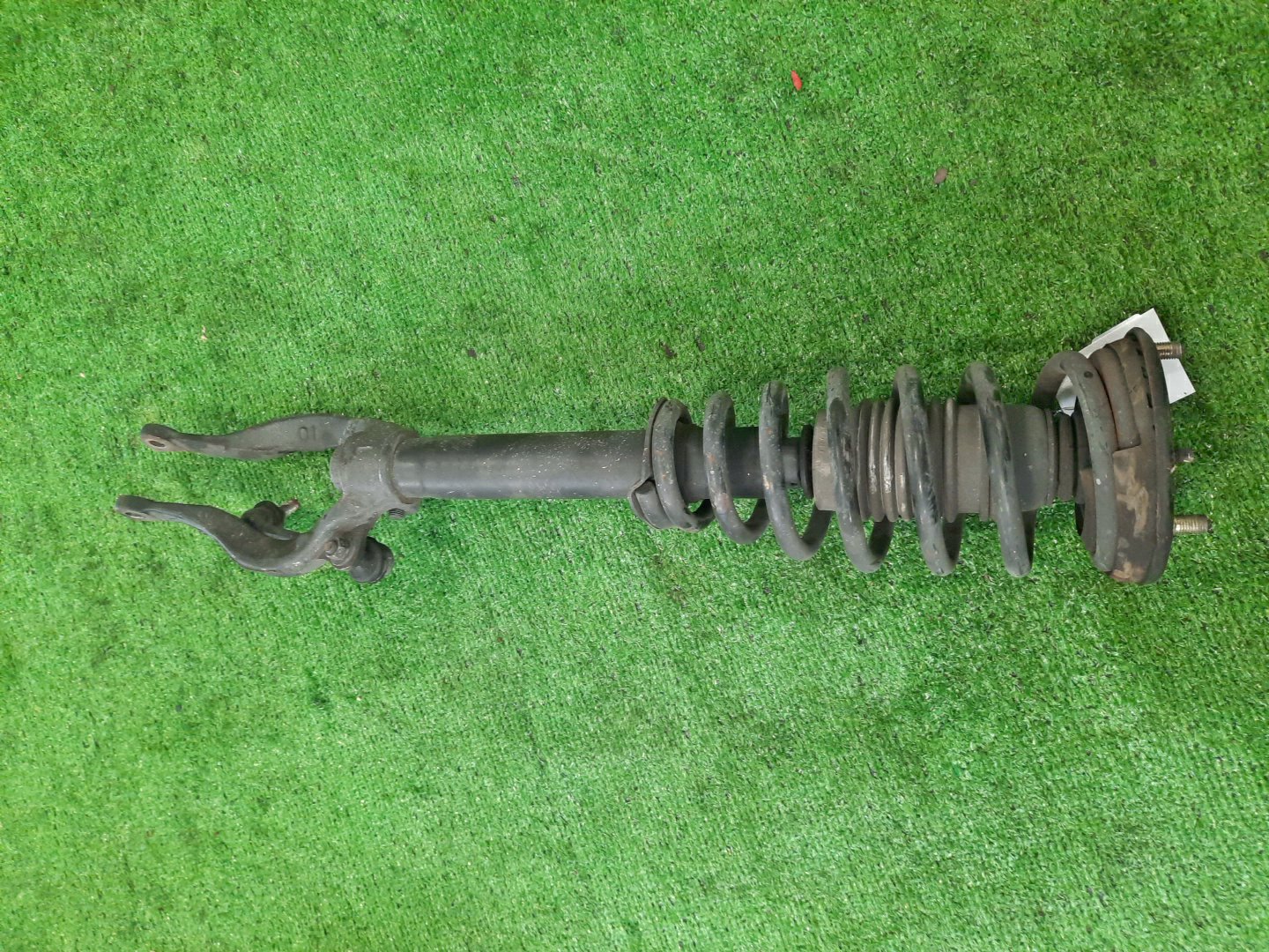 Стойка левая передняя MITSUBISHI GALANT, ETERNA, EMERAUDE E57A, E53A, EA1A, E52A, E54A, E72A, E74A, E77A 4D68T, 6A11, 4G93, 6A12, 4G63T, 4G63 1 ракурс Стойка левая передняя MITSUBISHI GALANT, ETERNA, EMERAUDE E57A, E53A, EA1A, E52A, E54A, E72A, E74A, E77A 4D68T, 6A11, 4G93, 6A12, 4G63T, 4G63 1 ракурс