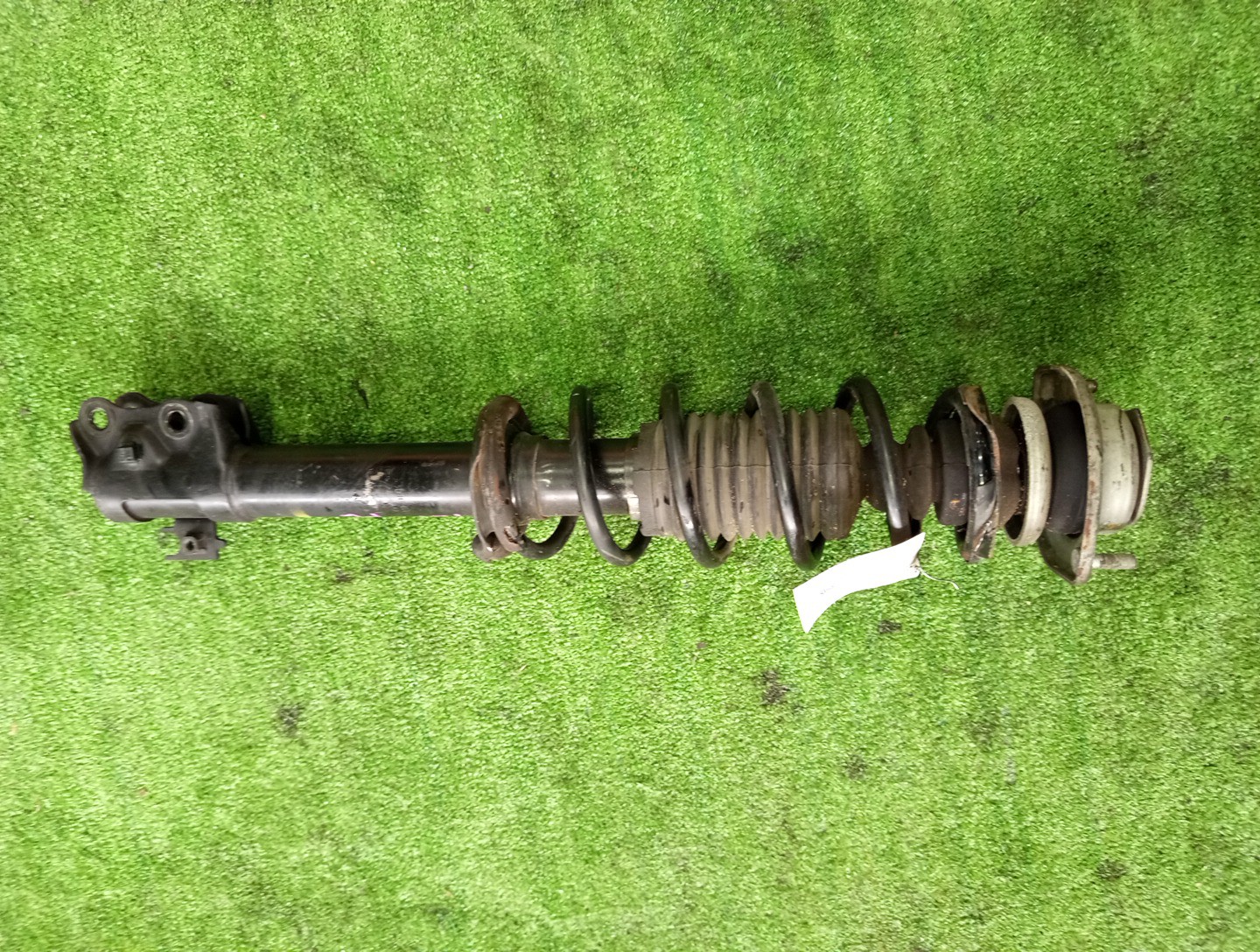 Стойка левая передняя DAIHATSU PASSO, BB, BOON, COO KGC15, KGC10, QNC10, QNC20, QNC21, QNC25, M301S, M310S, M300S, M401S, M402S, M411S 1KR-FE, K3-VE, 3SZ-VE 1 ракурс