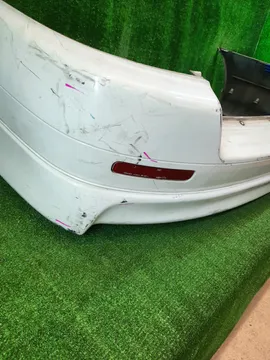 БАМПЕР НА TOYOTA CALDINA ST210