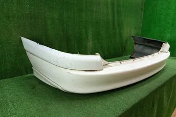 БАМПЕР НА TOYOTA CALDINA ST210