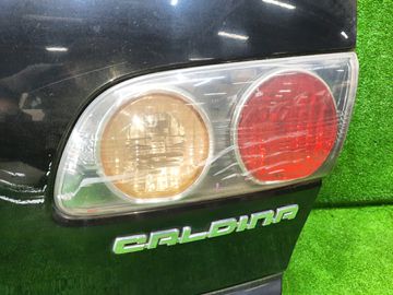 ДВЕРЬ ПЯТАЯ НА TOYOTA CALDINA ST210