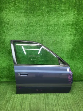 ДВЕРЬ НА TOYOTA CARINA ST215