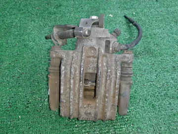 СУППОРТ ТОРМОЗОВ НА VOLKSWAGEN GOLF 1J1