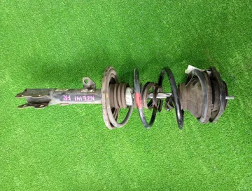 СТОЙКА НА TOYOTA COROLLA  AXIO NZE141 1NZ-FE