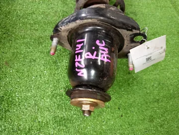 СТОЙКА НА TOYOTA COROLLA FIELDER NZE141G 1NZ-FE