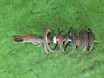 СТОЙКА НА TOYOTA COROLLA  AXIO NZE141 1NZ-FE